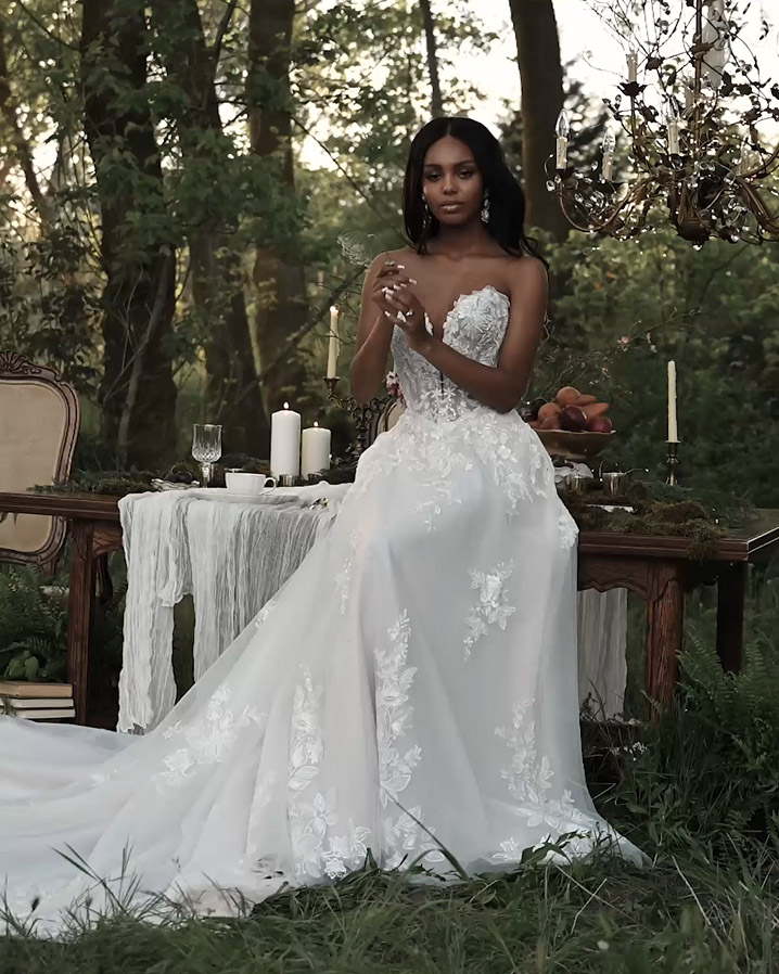 Photo of the model wearing a Rebecca Ingram gown
