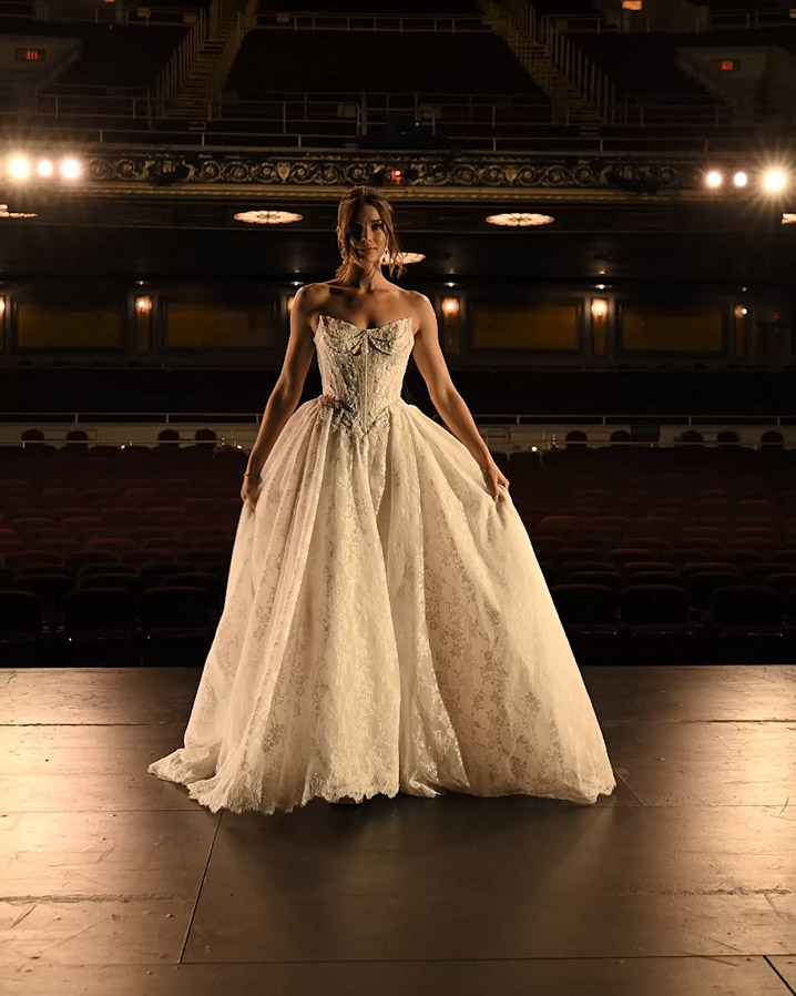 Photo of the model wearing a Maggie Sottero gown